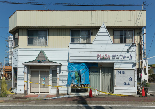 Abandoned shop in the highly contaminated area after the daiichi nuclear power plant irradiation, Fukushima prefecture, Tomioka, Japan