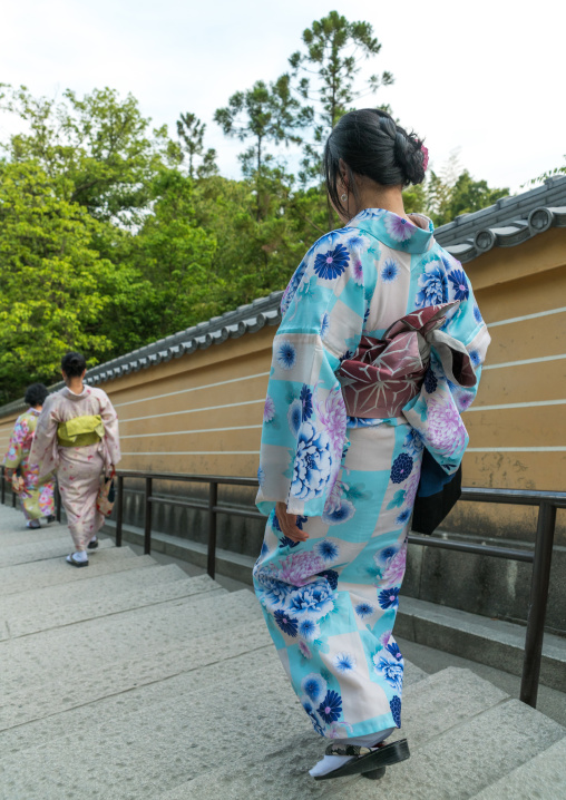 Chinese tourist women wearing geisha kimonos, Kansai region, Kyoto, Japan