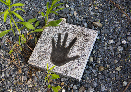 Handprint in the garden of house in the highly contaminated zone after the daiichi nuclear power plant explosion, Fukushima prefecture, Iitate, Japan