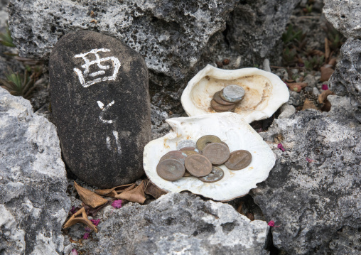 Offerings collected in shells, Yaeyama Islands, Taketomi island, Japan