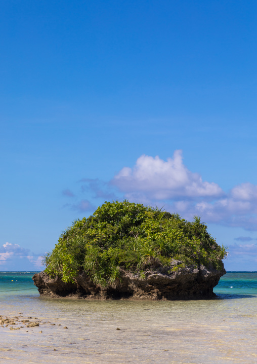 Huge rock in the tropical lagoon with clear blue water in Kabira bay, Yaeyama Islands, Ishigaki, Japan