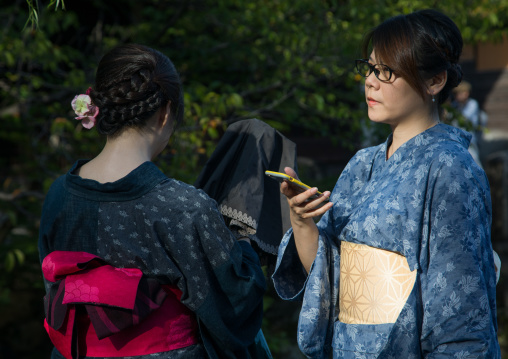 Japanese women in traditional clothing in Bikan historical quarter, Okayama Prefecture, Kurashiki, Japan
