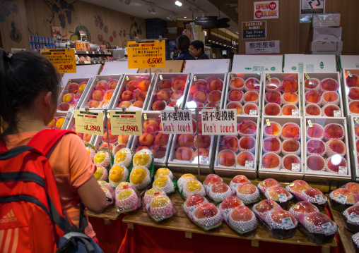 Peaches for sale in Kuromon ichiba market, Kansai region, Osaka, Japan