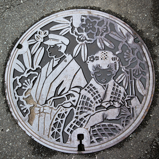 Manhole cover in the street, Izu peninsula, Izu, Japan
