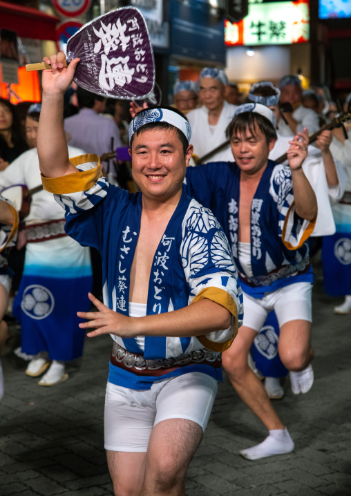Japanese dancers during the Koenji Awaodori dance summer street festival, Kanto region, Tokyo, Japan
