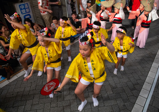 Japanese children during the Koenji Awaodori dance summer street festival, Kanto region, Tokyo, Japan