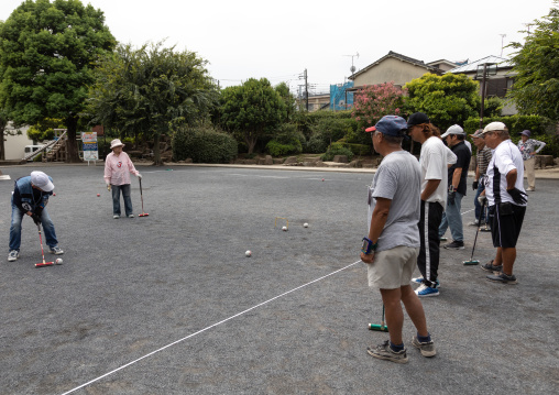 Senior japanese people playing gateball, Kanto region, Tokyo, Japan