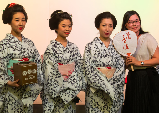 Maiko women making a game on stage, Kansai region, Kyoto, Japan