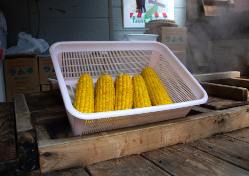 Corns for sale to cook in the hot steam of Kamado jigoku cooking pot hell, Oita Prefecture, Beppu, Japan