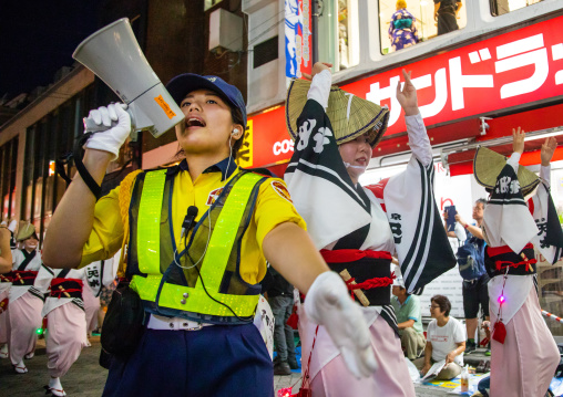 Police during the Koenji Awaodori dance summer street festival, Kanto region, Tokyo, Japan