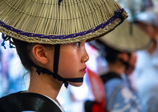 Japanese child with straw hat during the Koenji Awaodori dance summer street festival, Kanto region, Tokyo, Japan
