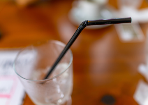 Plastic straw in a drinking glass, Ishikawa Prefecture, Kanazawa, Japan