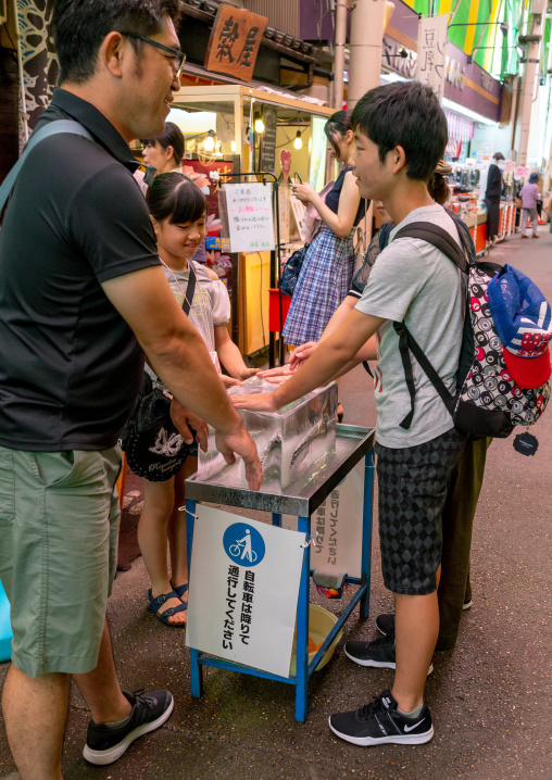 Ice to let the people refresh themselves in omicho market during a heatwave, Ishikawa Prefecture, Kanazawa, Japan