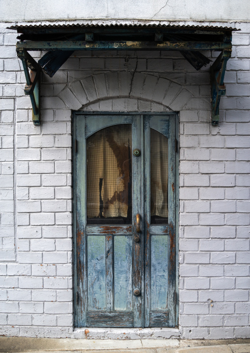 Old door of a colonial building, Kansai region, Kyoto, Japan