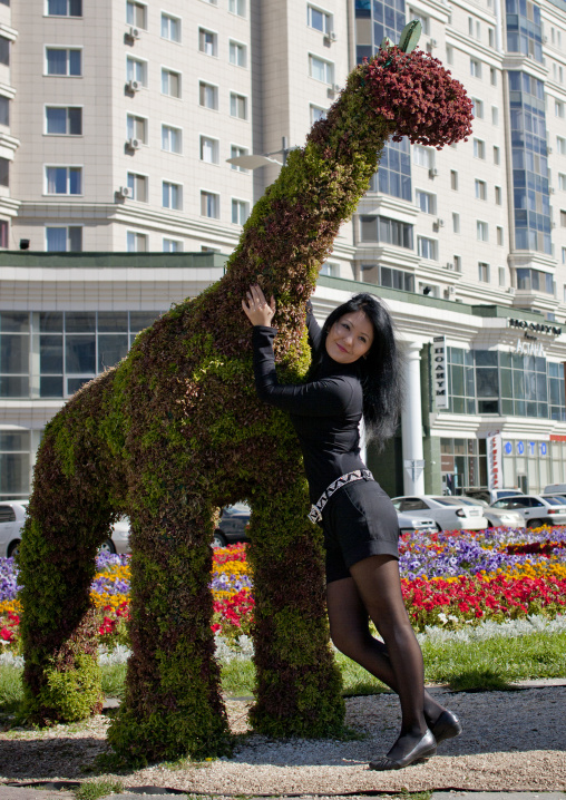Local Tourist Posing On A Vegetal Sculpture, Astana, Kazakhstan