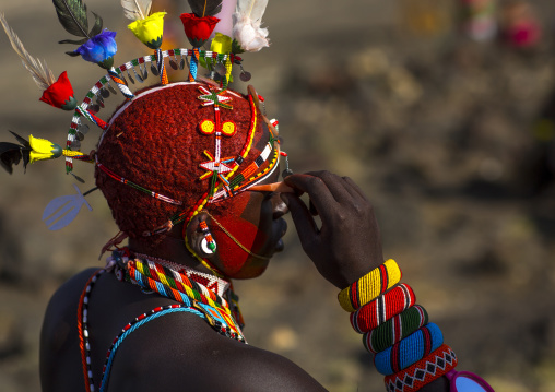 Portrait of rendille warrior wearing traditional headwear, Turkana lake, Loiyangalani, Kenya