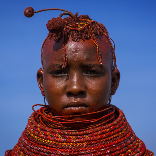 Turkana tribe woman with huge necklaces and ear rings, Turkana lake, Loiyangalani, Kenya