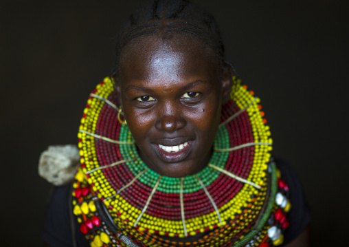 Turkana tribe woman with huge necklaces and ear rings, Turkana lake, Loiyangalani, Kenya
