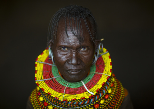 Turkana tribe woman with huge necklaces and earrings, Turkana lake, Loiyangalani, Kenya