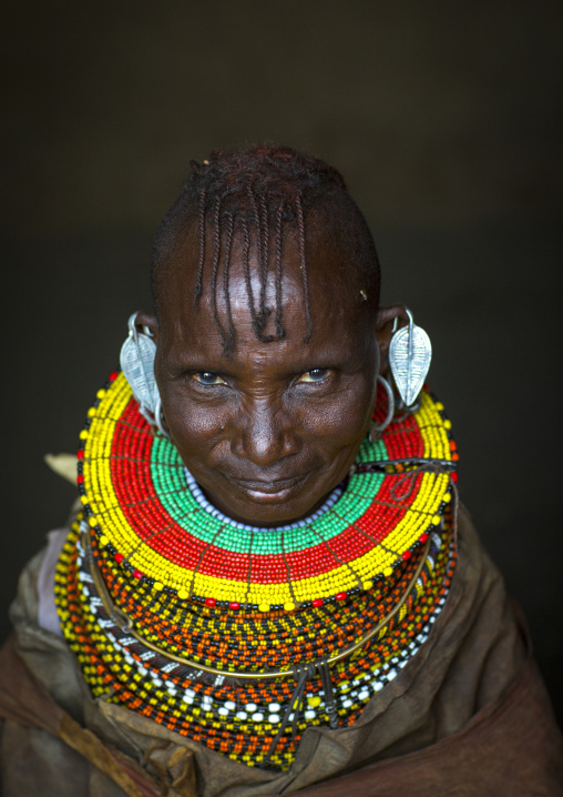 Turkana tribe woman with huge necklaces and earrings, Turkana lake, Loiyangalani, Kenya