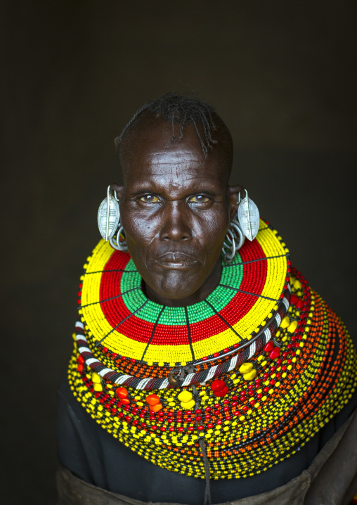 Turkana tribe woman with huge necklaces and earrings, Turkana lake, Loiyangalani, Kenya