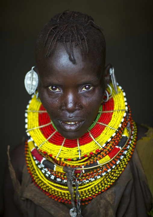 Turkana tribe woman with huge necklaces and earrings, Turkana lake, Loiyangalani, Kenya