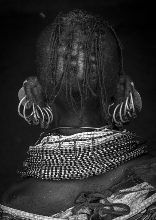 Turkana tribe woman with huge necklaces and earrings, Turkana lake, Loiyangalani, Kenya