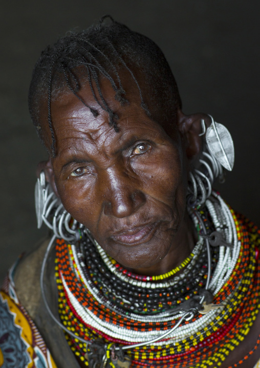 Turkana tribe woman with huge necklaces and earrings, Turkana lake, Loiyangalani, Kenya