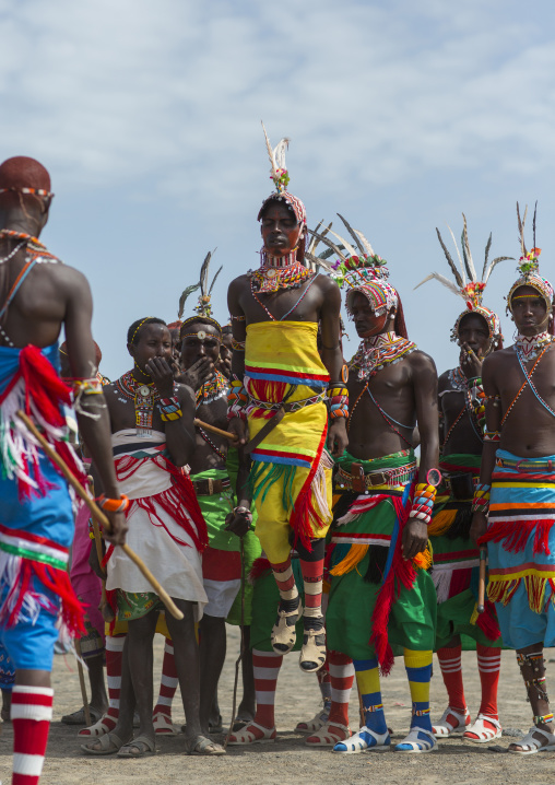 Portrait of rendille warriors dancing and jumping, Turkana lake, Loiyangalani, Kenya