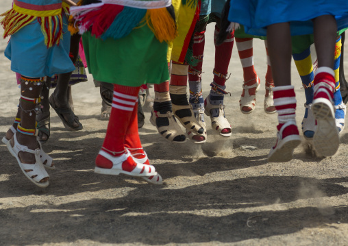 Rendille tribe warriors wearing jelly shoes and socks, Turkana lake, Loiyangalani, Kenya