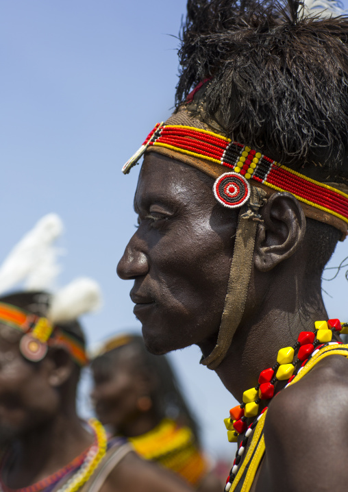 Turkana tribesman with headwear made of ostrich black feathers, Turkana lake, Loiyangalani, Kenya