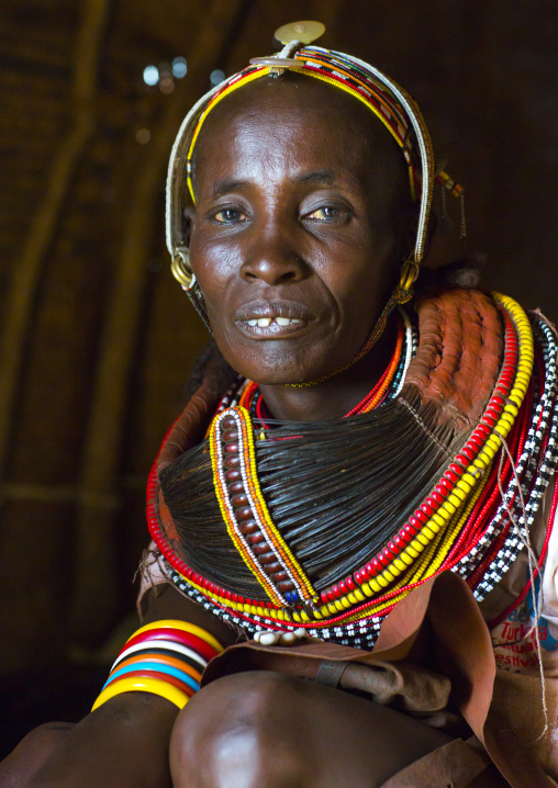 Rendille tribeswoman wearing traditional headdress and mpooro engorio necklace, Turkana lake, Loiyangalani, Kenya