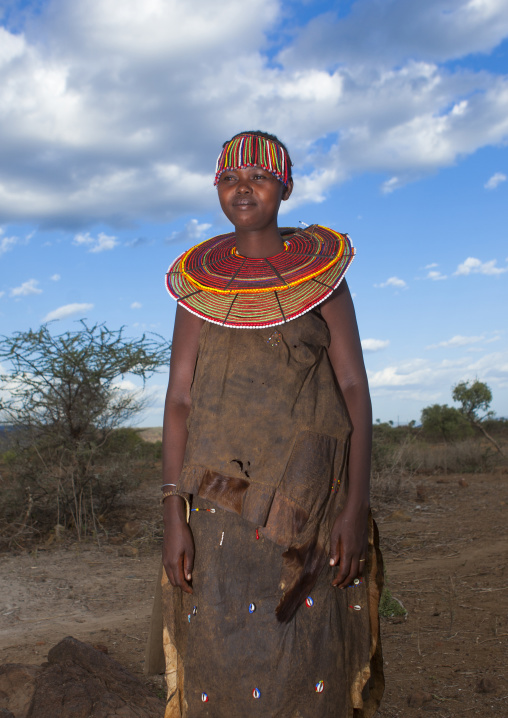 A pokot woman wears large necklaces made from the stems of sedge grass, Baringo county, Baringo, Kenya