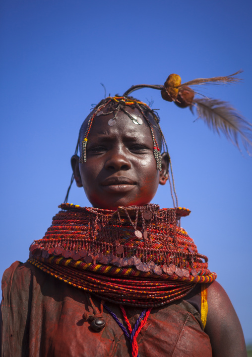 Turkana tribe woman with huge necklaces and ear rings, Turkana lake, Loiyangalani, Kenya