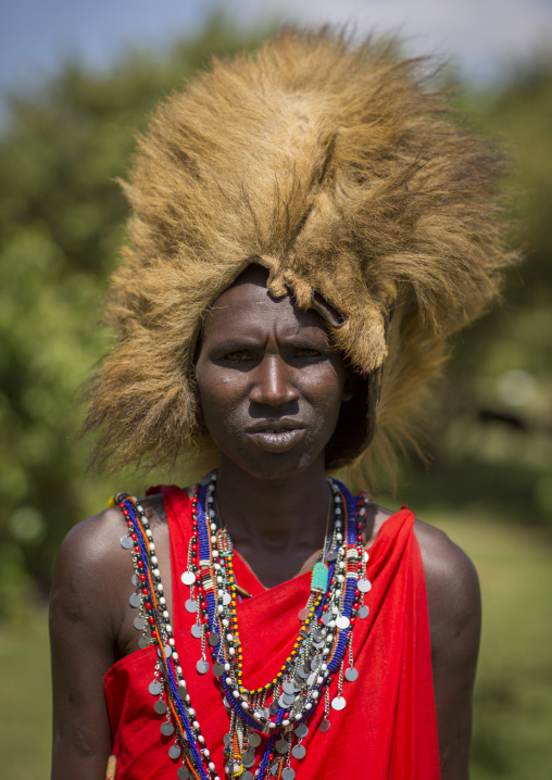 Maasai warrior with a lion hat fur on the head, Nakuru county, Nakuru, Kenya