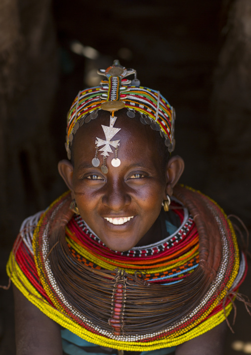 Rendille tribeswoman wearing traditional headdress and mpooro engorio necklace, Marsabit district, Ngurunit, Kenya
