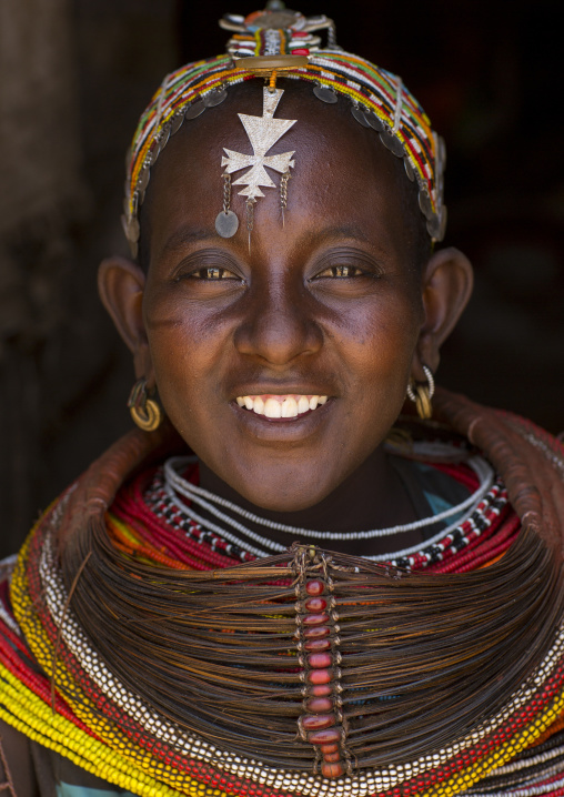 Rendille tribeswoman wearing traditional headdress and mpooro engorio necklace, Marsabit district, Ngurunit, Kenya