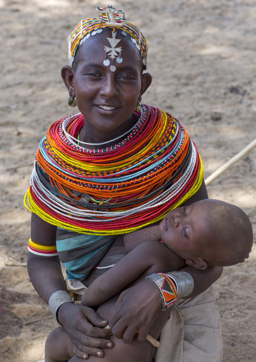 Rendille tribeswoman holding her baby, Marsabit district, Ngurunit, Kenya