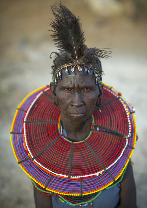 A pokot woman wears large necklaces made from the stems of sedge grass, Baringo county, Baringo, Kenya