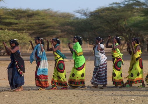 Gabra tribe women dancing in line, Marsabit County, Chalbi Desert, Kenya