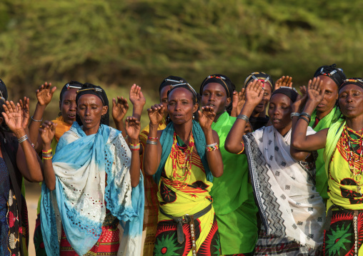 Gabra tribe women dancing in line, Marsabit County, Chalbi Desert, Kenya