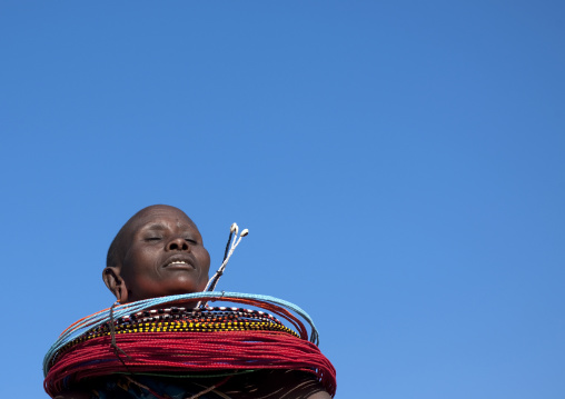 Samburu tribe woman with beaded necklaces dancing, Samburu County, Maralal, Kenya