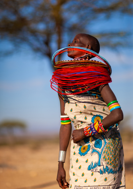 Samburu tribe woman with beaded necklaces dancing, Samburu County, Maralal, Kenya
