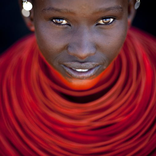Portrait of a young Samburu tribe woman with red necklaces, Samburu County, Maralal, Kenya