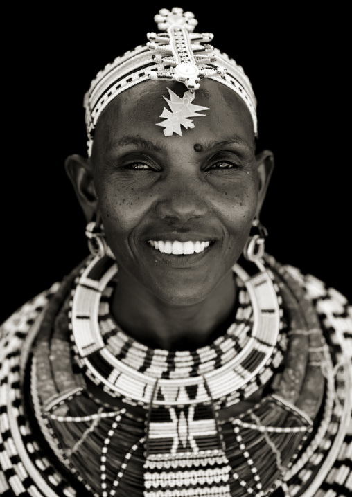 Portrait of a smiling Samburu tribe woman with beaded necklaces, Samburu County, Maralal, Kenya