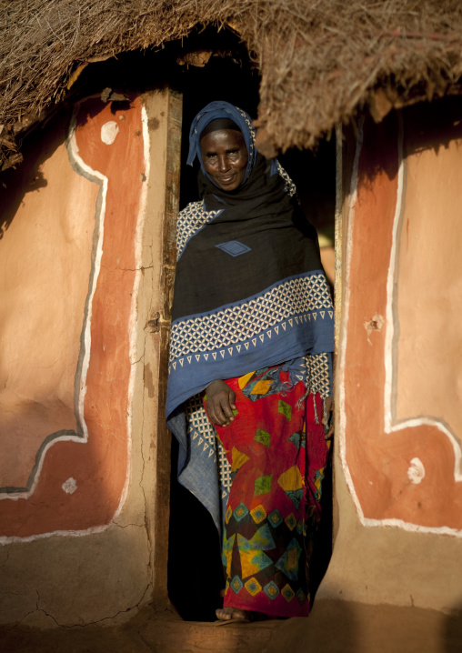 Portrait of a Borana tribe woman in front of her house, Marsabit County, Marsabit, Kenya