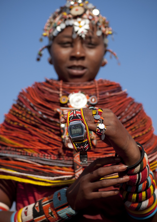 Portait of a young Rendille tribe woman with a beaded watch, Marsabit County, Marsabit, Kenya