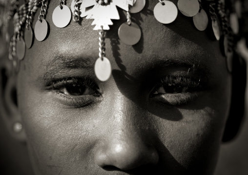 Portait of a young Rendille tribe girl with a silver headwear, Marsabit County, Marsabit, Kenya