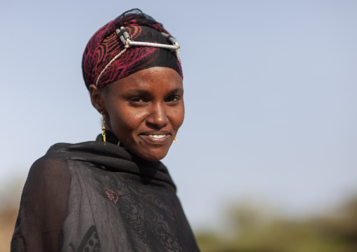 Portrait of a Gabra tribe woman wearing the traditional headwear, Marsabit County, Chalbi Desert, Kenya