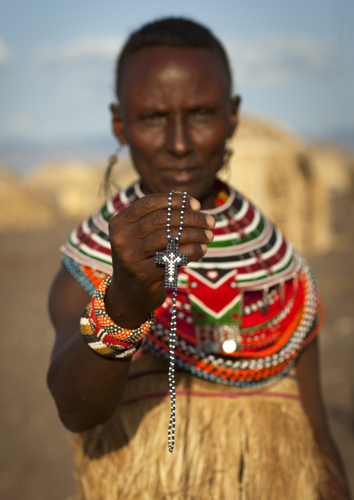 El molo tribeswoman showing a christian cross, Turkana lake, Loiyangalani, Kenya